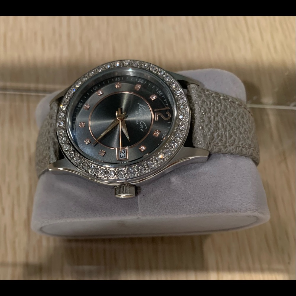 KENNETH COLE GRAY LEATHER WATCH WITH ROSE GOLD TRIM & DIAMONDS need battery